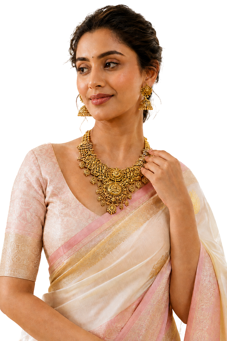 Woman in a sari wearing a gold necklace